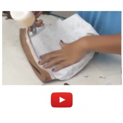 Trabalho c/ colas à base de solventes na fabricação de bolsas e calçados.